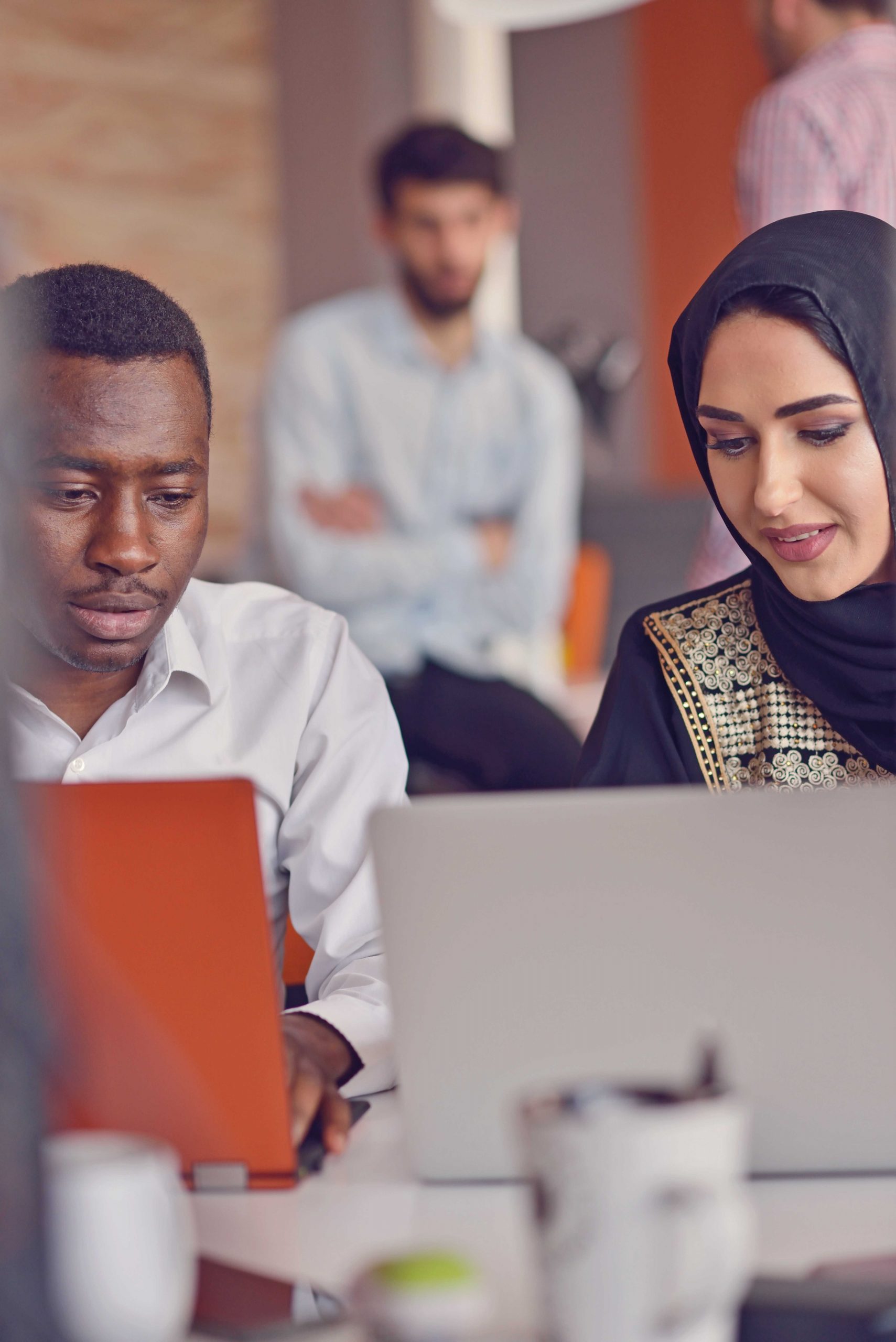 Group Young Coworkers Making Great Business Decisions.Creative Team Discussion Corporate Work Concept Modern Office.New Startup Marketing Idea Presentation.Woman Touching Digital Laptop.Top View